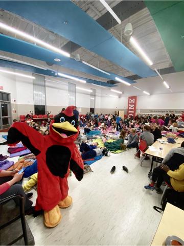 Abingdon Cardinal welcoming participants to Movie Night