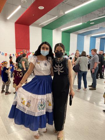 Participants in Salvadorean and Chinese dress at International Night