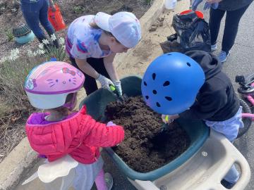 Photo of volunteers planting the pollinator garden